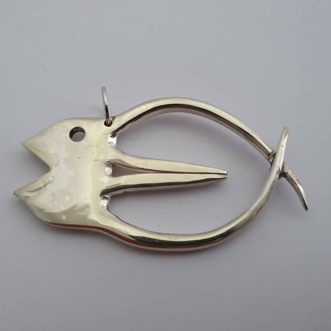 handmade metal art object made from cutlery and reused metal parts