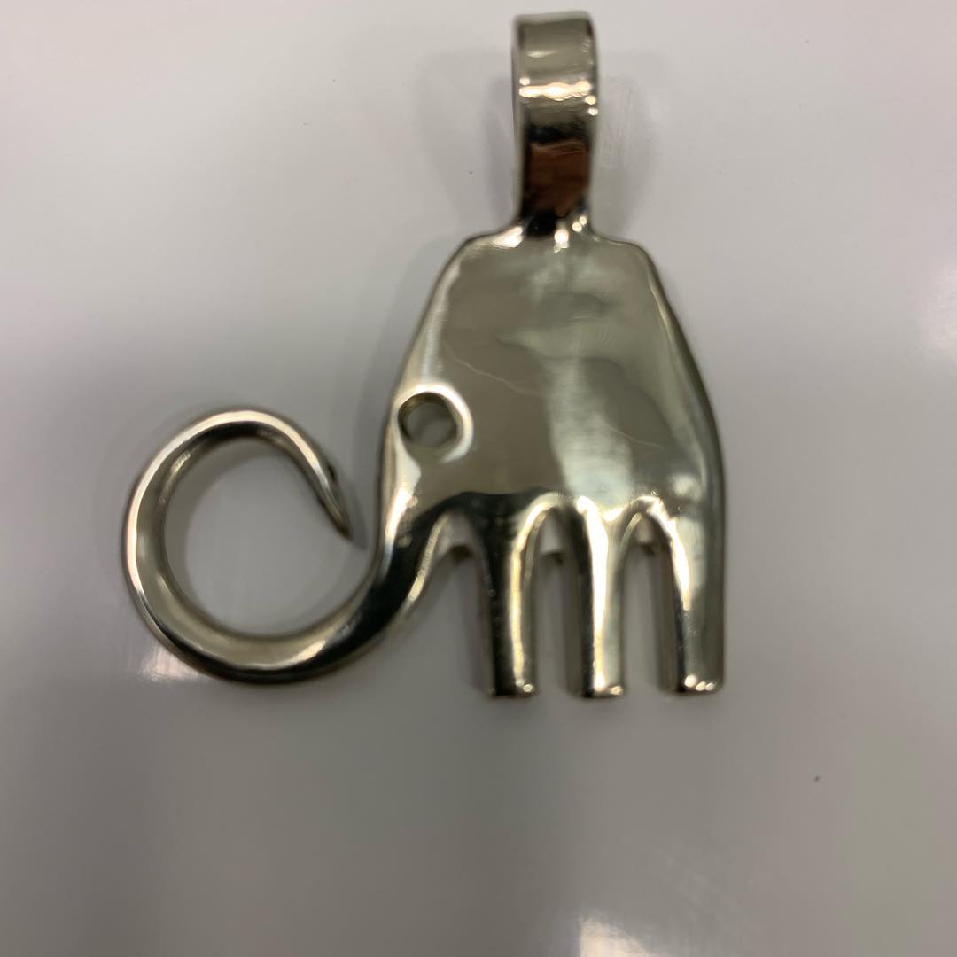 handmade metal art sculpture from coins and brass