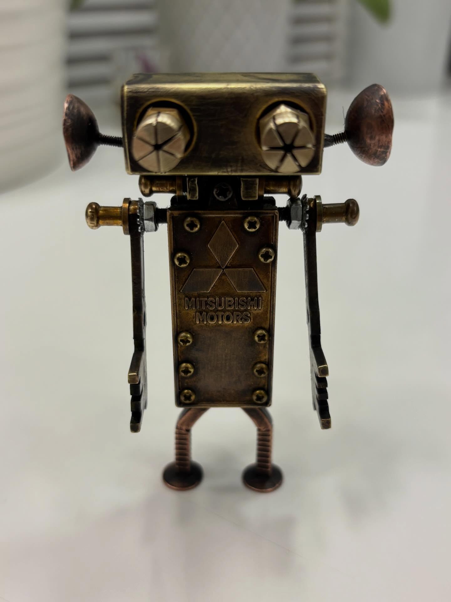 handmade owl metal art object made from copper and brass