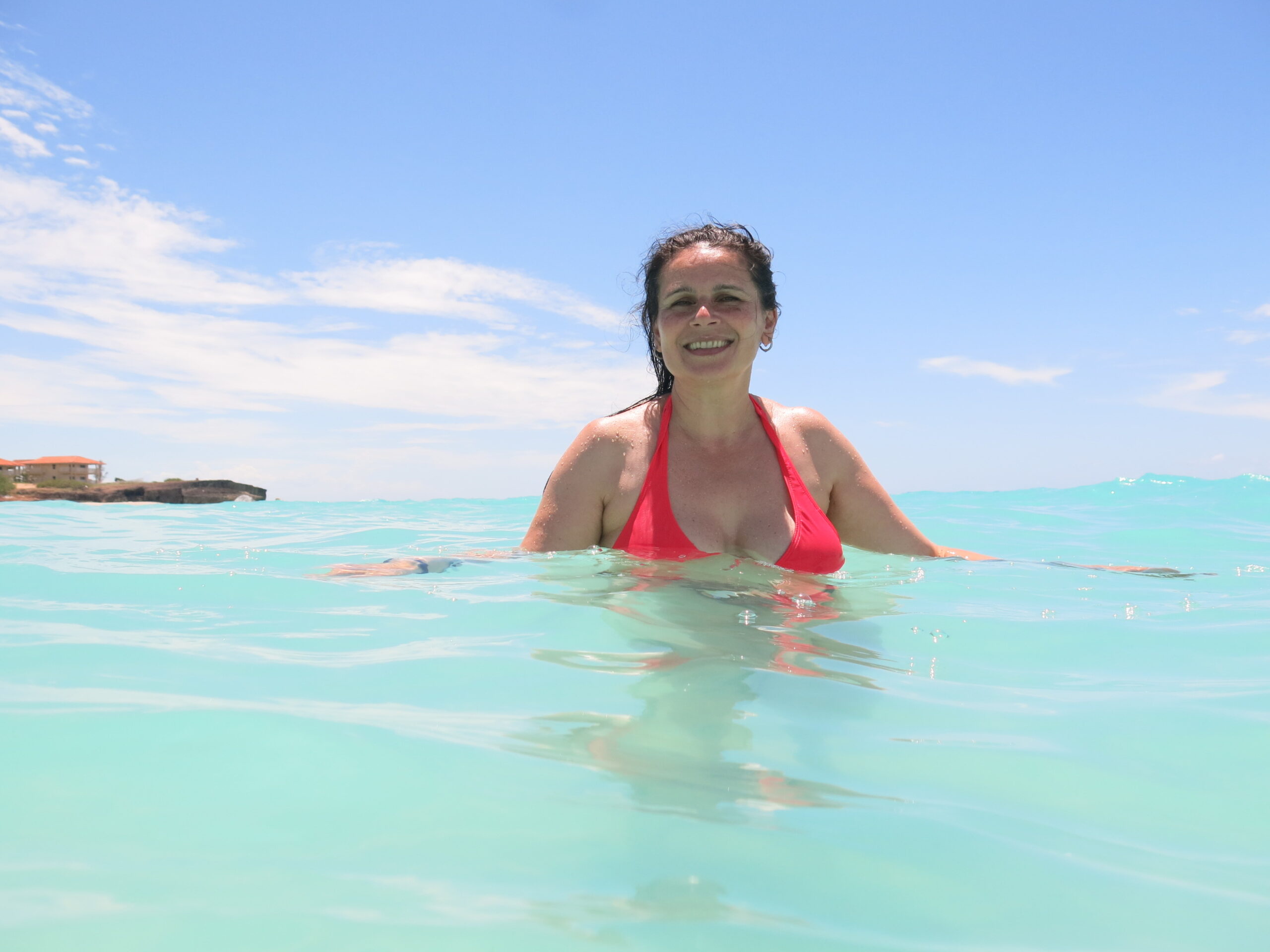 Sanda travel memory with Zuzana in turquoise water